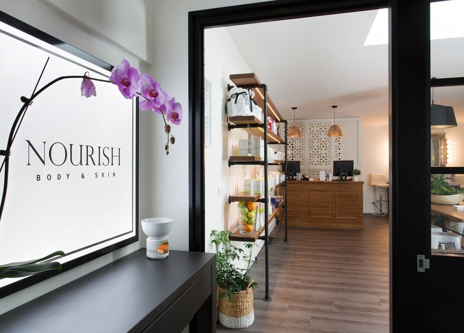 Entrance of Nourish Spa and Skin Clinic in Melbourne, VIC, AU, showcasing a welcoming and tranquil ambiance.