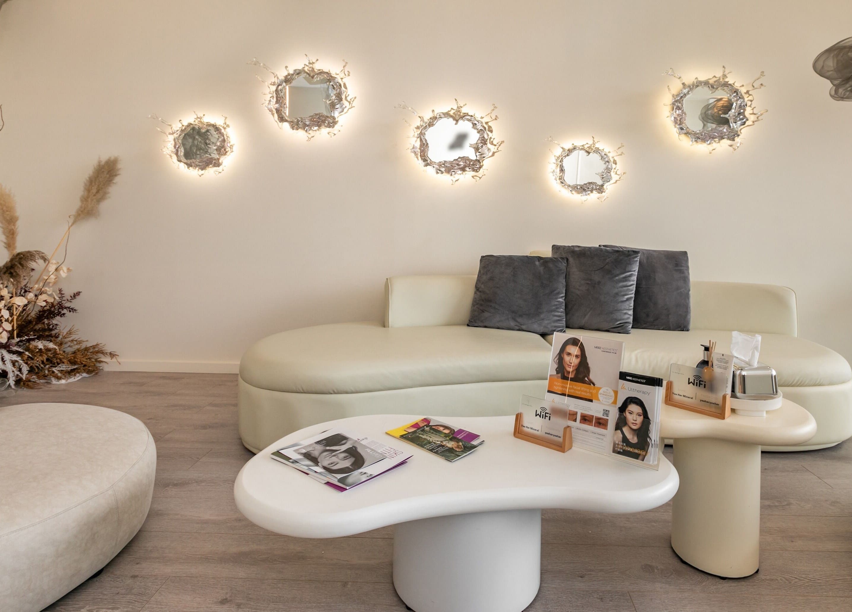 Tranquil seating area at Yee Her Mineral, Melbourne, Victoria, AU, featuring chic decor and warm lighting.