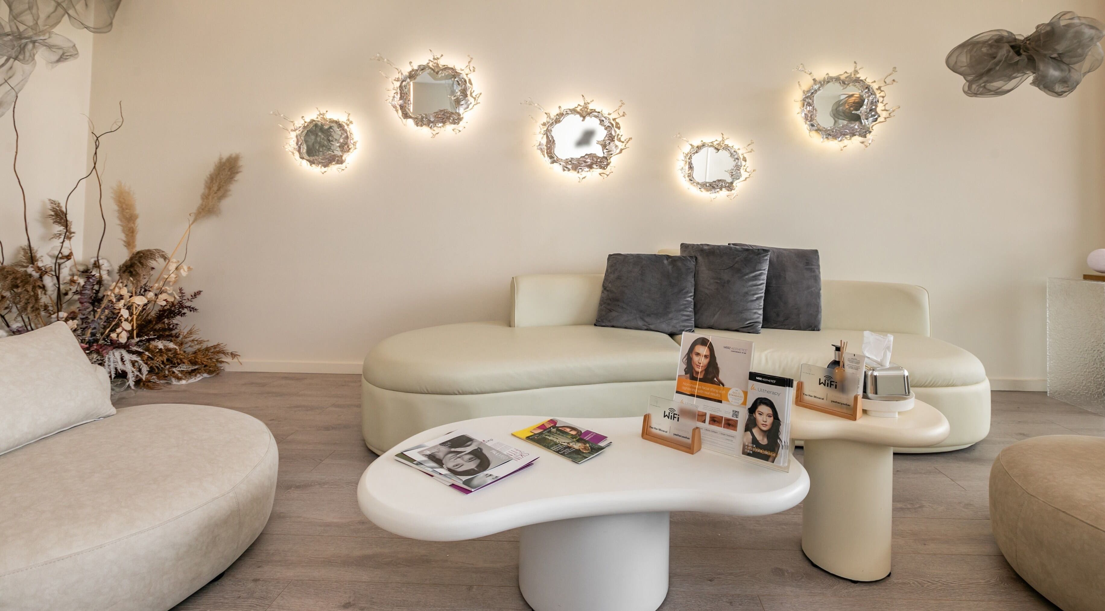 Tranquil seating area at Yee Her Mineral, Melbourne, Victoria, AU, featuring chic decor and warm lighting.