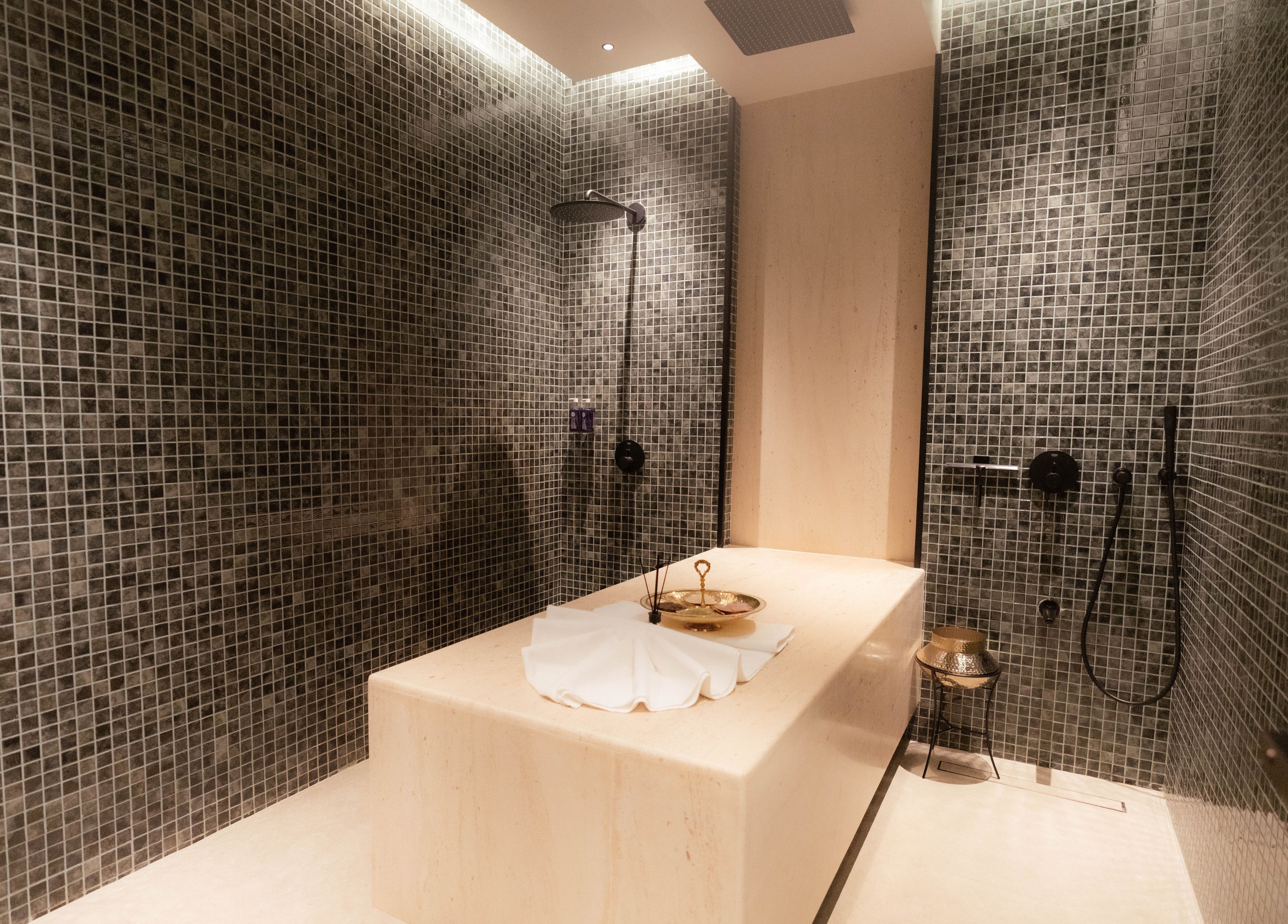 Relaxing spa room at Alpha Spa, Riyadh, Riyadh Province, SA, featuring luxurious massage table and serene ambiance.