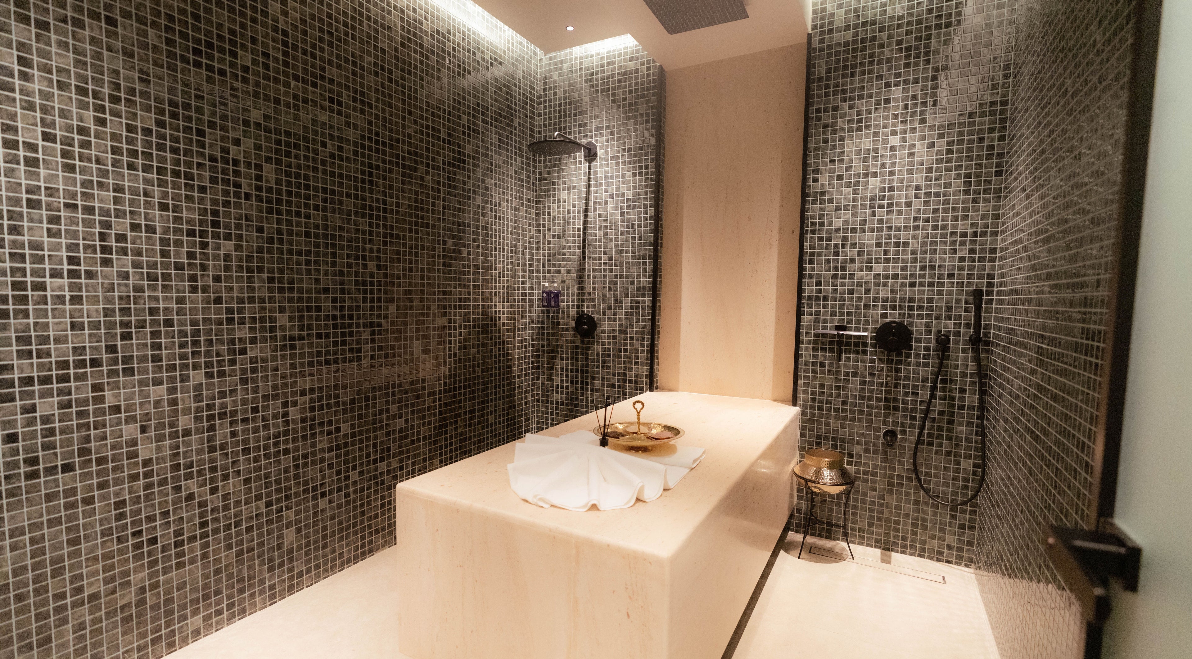 Relaxing spa room at Alpha Spa, Riyadh, Riyadh Province, SA, featuring luxurious massage table and serene ambiance.