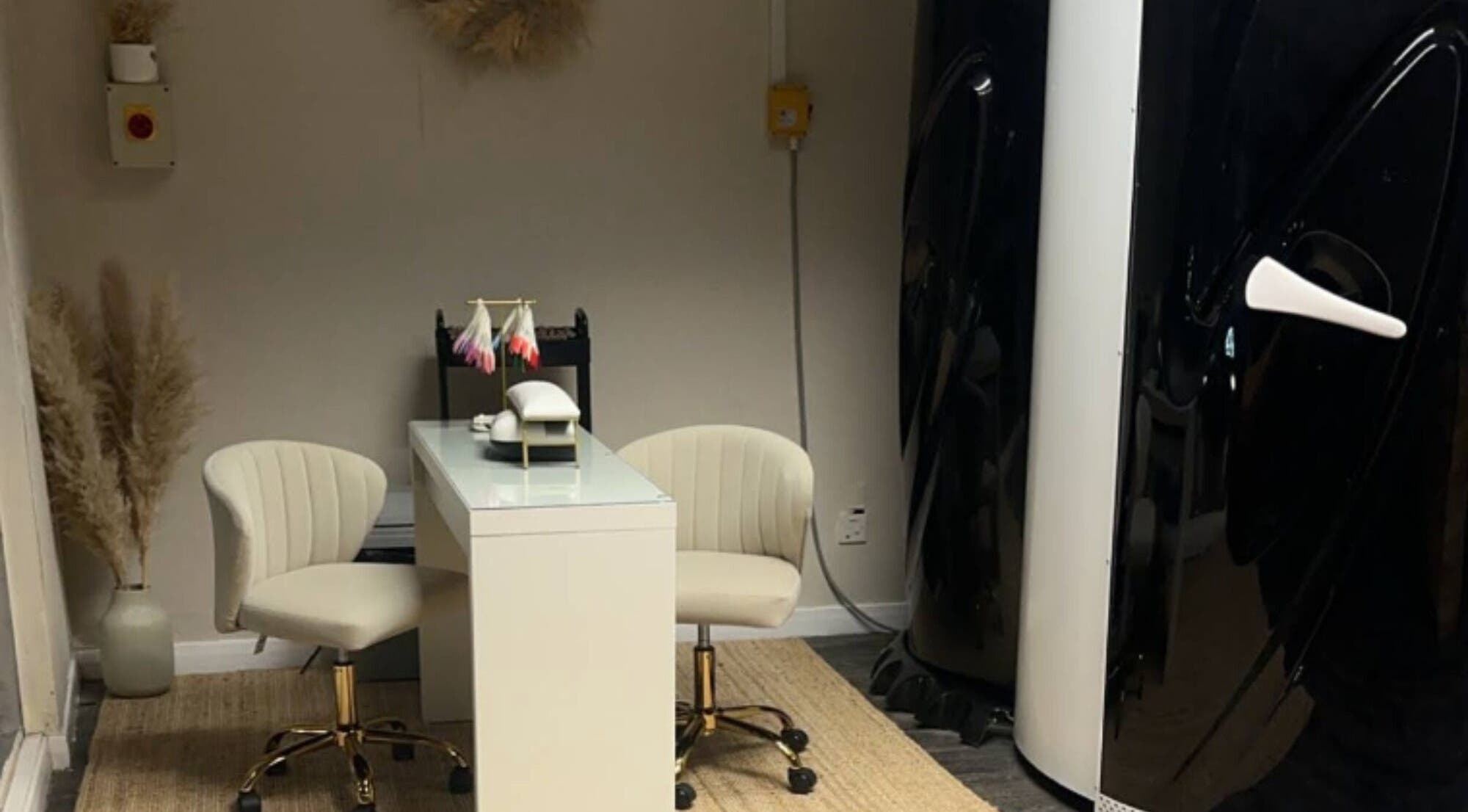 Premier Tanning salon room with chairs and decor in Brigg, England, GB offering a soothing atmosphere.