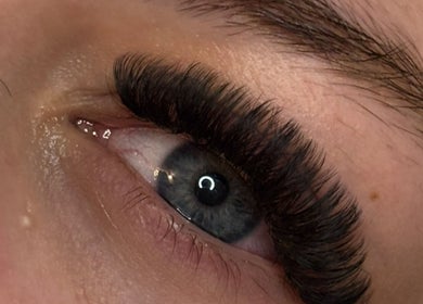 Stunning eyelash extensions at Lovely Lashes By Sofia in Widley, England, GB, enhancing natural blue eyes.