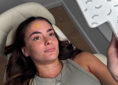 Client admiring her lashes at Lovely Lashes By Sofia in Widley, England, GB.