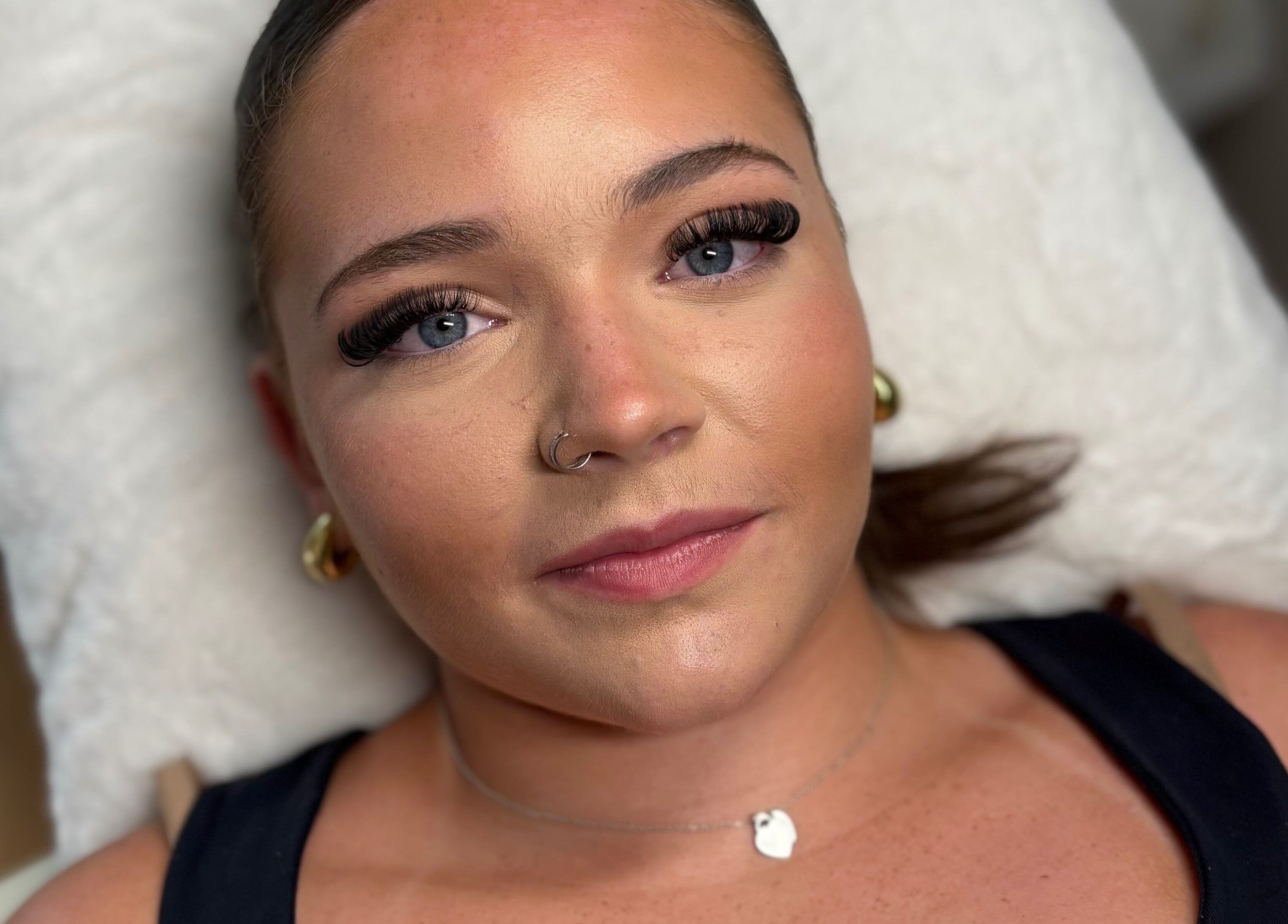 Woman with styled lashes at Lovely Lashes By Sofia, Widley, England, GB, showcasing impeccable beauty care.