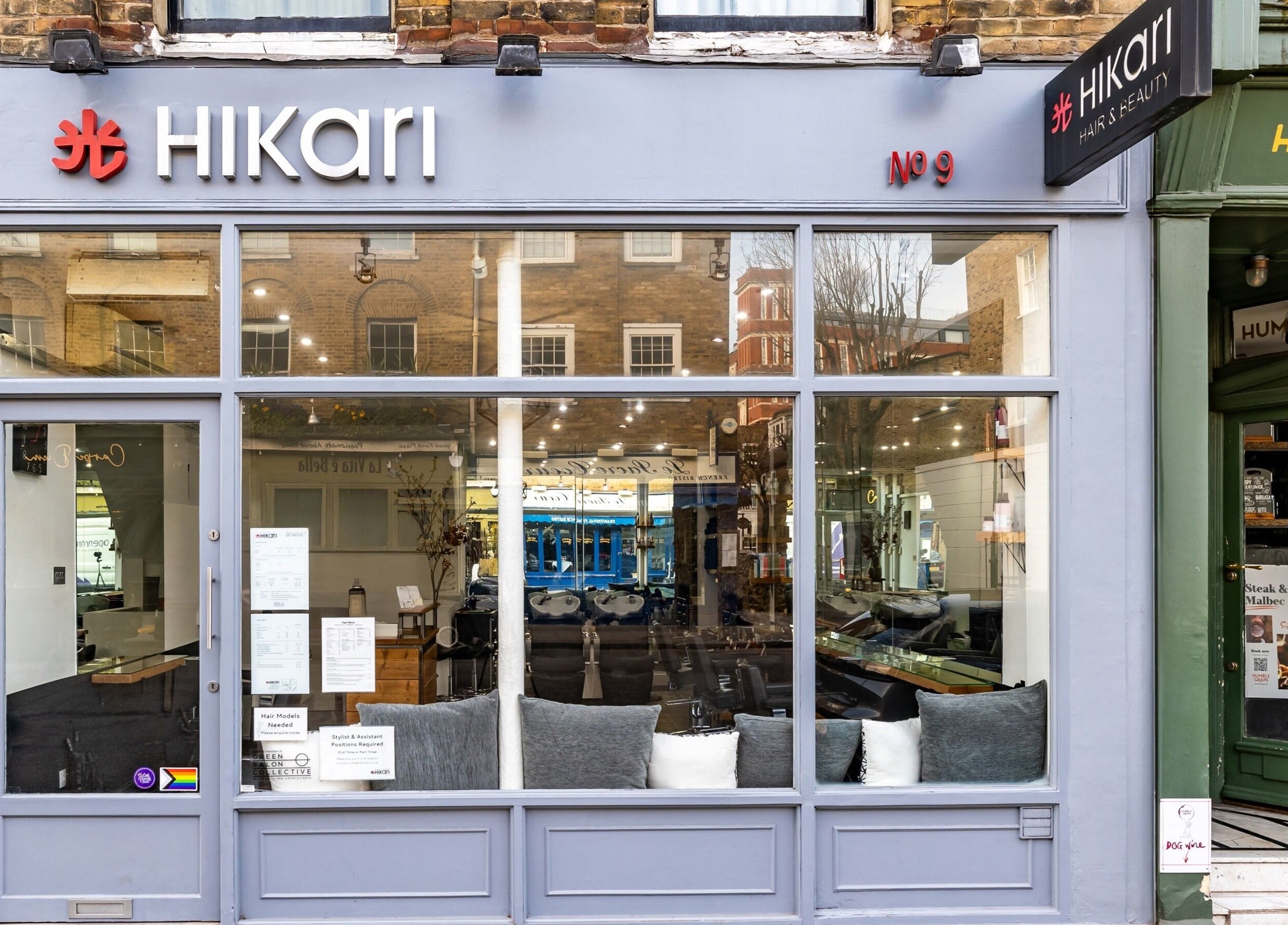 Front view of Hikari Salon in London, England, GB, showcasing stylish glass facade and welcoming entrance.