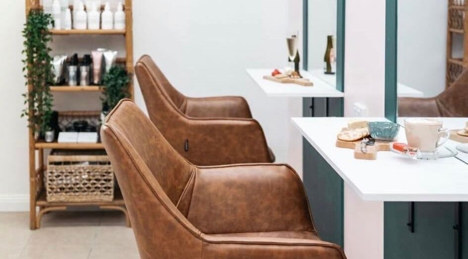 Elegant seating at Kew Hair and Beauty Salon in Browns Plains, Queensland, AU, showcasing style and comfort.
