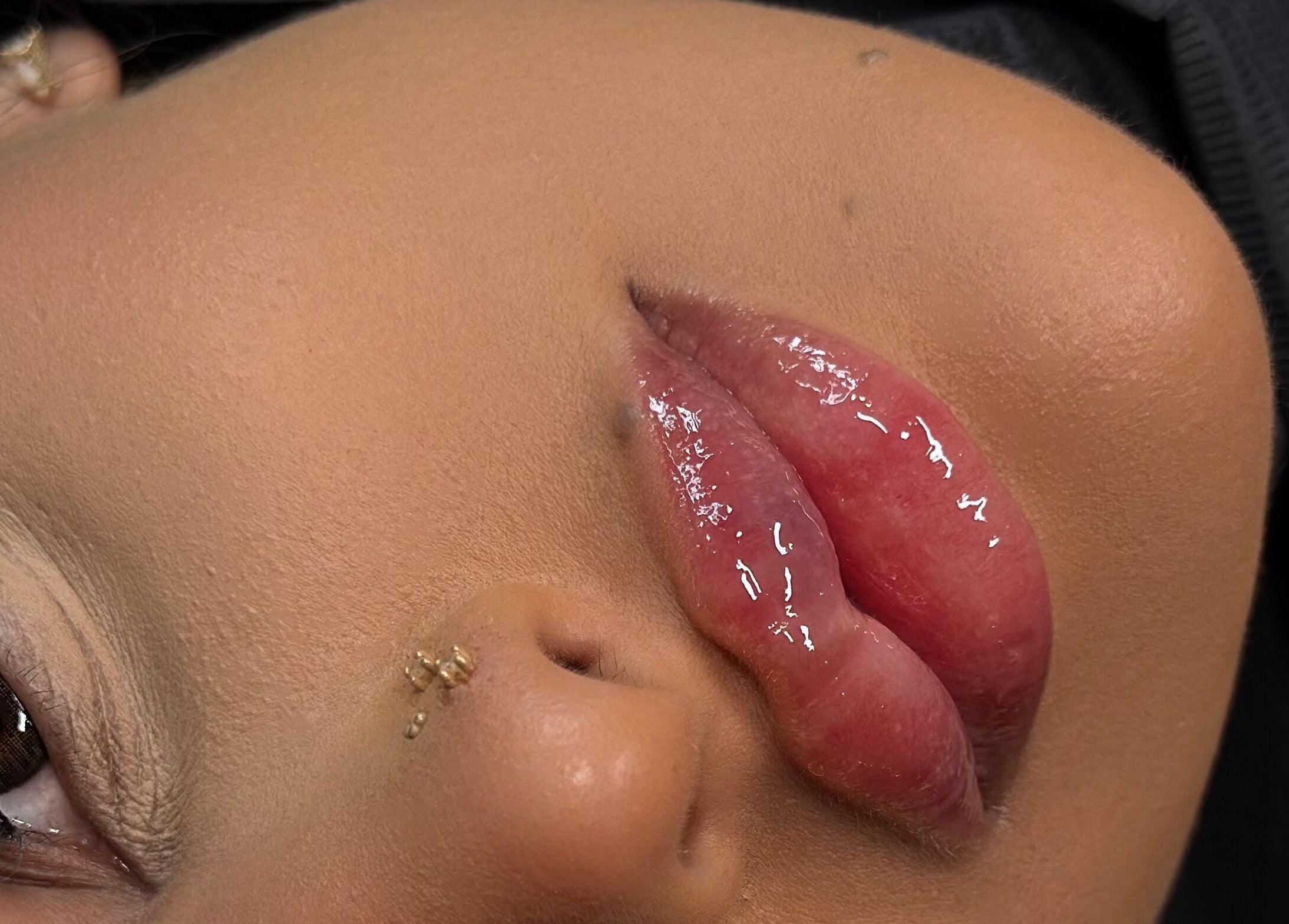 Close-up of glossy lips at Julia Clark Aesthetics & Academy, Redbourn, England, GB.