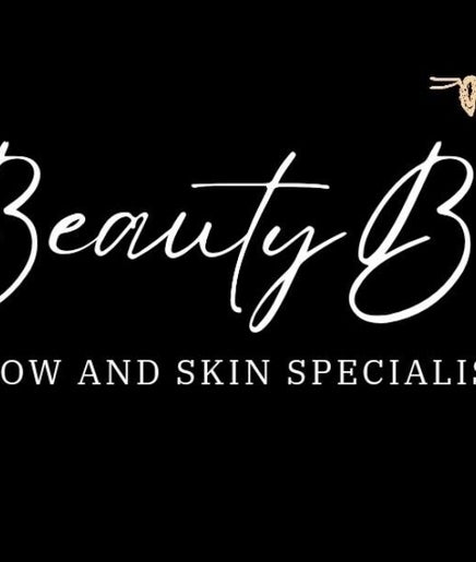 Beauty Bee logo on black background in Dover, England, GB.