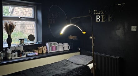 Relaxing therapy room at Beauty Bee, Dover, England, GB, with a treatment bed and elegant decor.