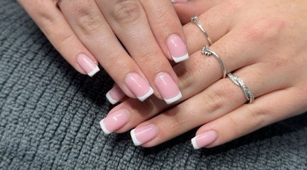 Elegant French manicure at Luxe Lush, Holywell, Flintshire, GB, showcasing refined nail art.