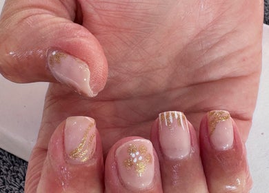 Elegant gold glitter nail art at Luxe Lush, Holywell, Flintshire, GB.