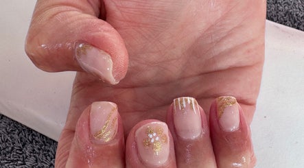 Elegant gold glitter nail art at Luxe Lush, Holywell, Flintshire, GB.
