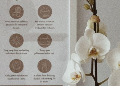 Elegant orchid next to skincare advice at Kati Aesthetics, London, England, GB.