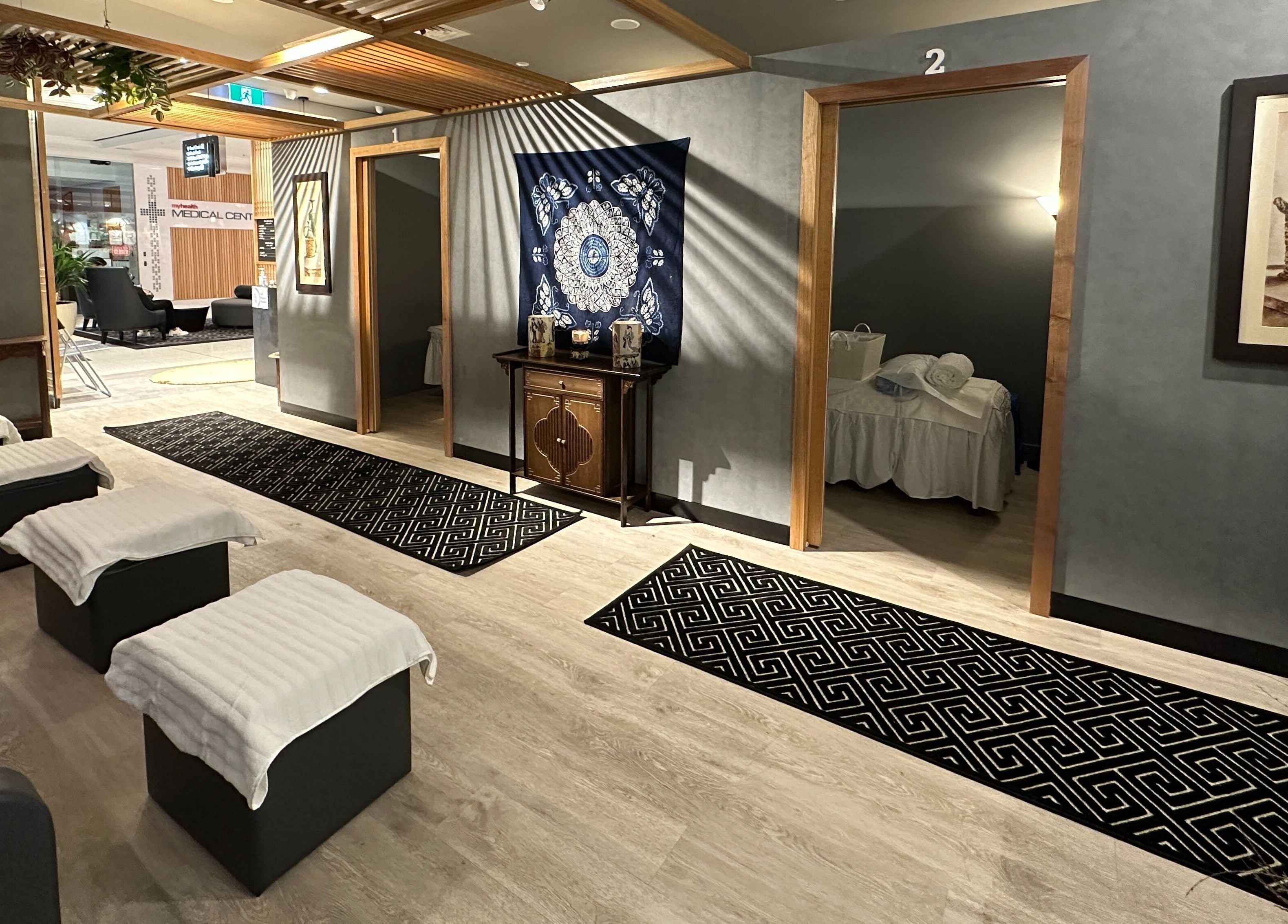 Zen Massage & Reflexology in Chatswood, New South Wales, AU offers a tranquil spa treatment room with elegant decor.