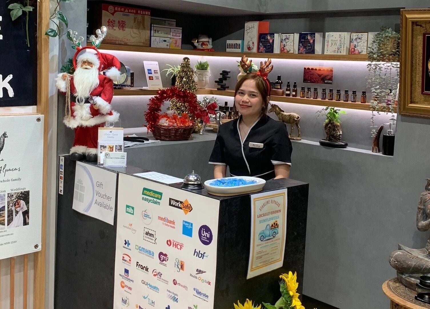Warm reception area at Zen Massage & Reflexology in Chatswood, New South Wales, AU, with inviting decor.