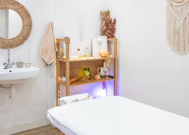 Tranquil massage room at Sy Relax Massage & Wellness, Amsterdam, Noord-Holland, NL with cozy decor.