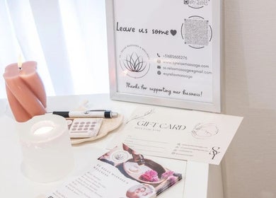 Sy Relax Massage & Wellness gift cards and contact display in Amsterdam, Noord-Holland, NL.