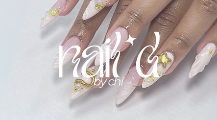 Stylish manicured nails at NAIL'D BY CHI, Pickering, Ontario, CA, featuring exquisite gold embellishments.