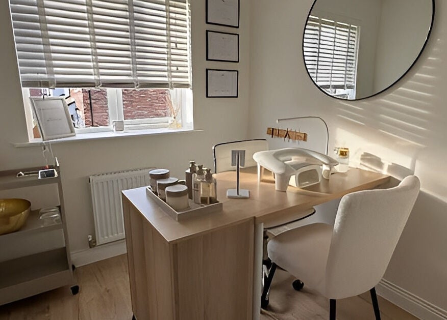 Bright nail care station at So-Swifticated Beauty By Anna, Farington, England, GB. Cozy wood desk and natural light.