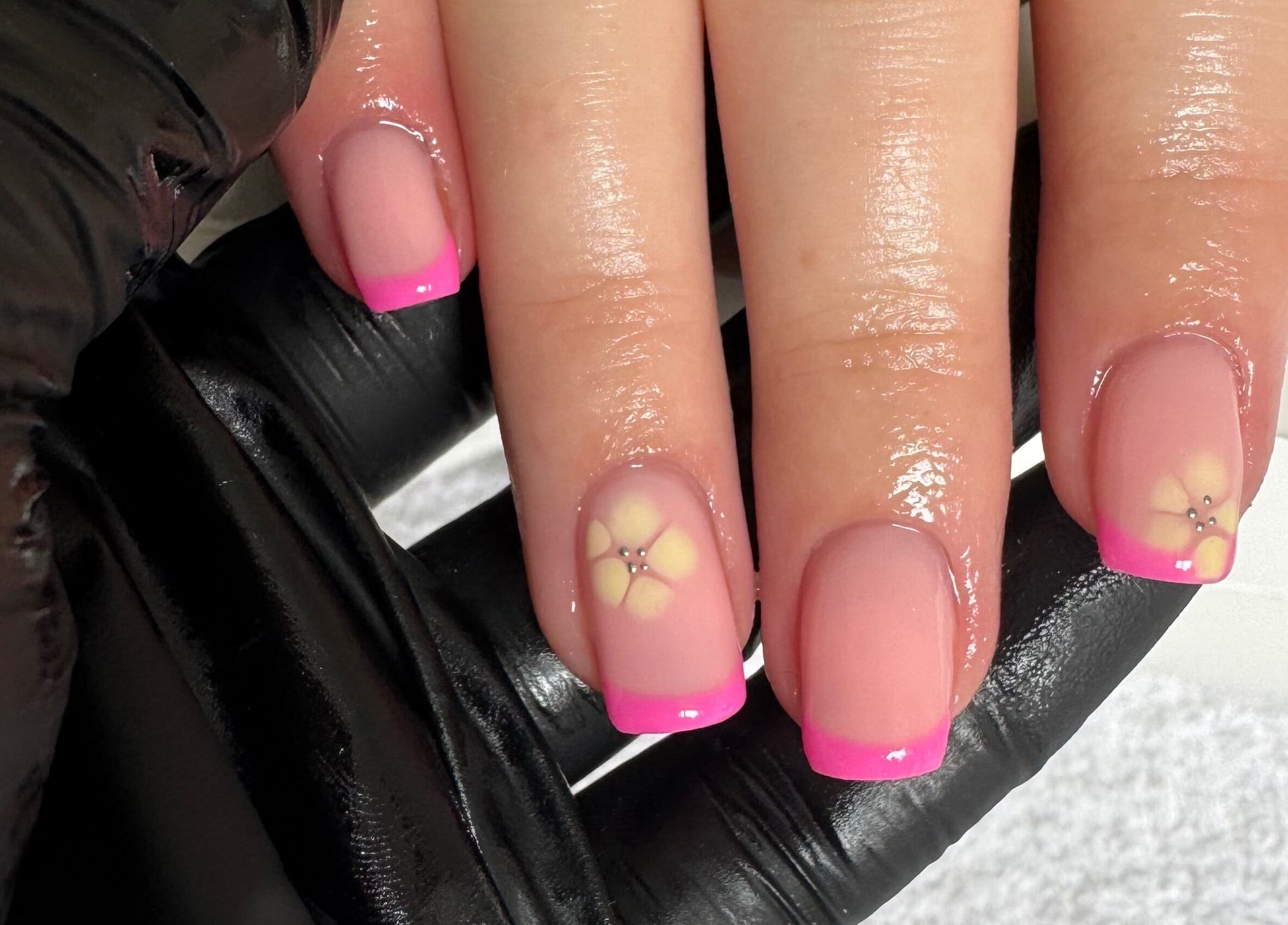 Elegant floral nails with pink tips at So-Swifticated Beauty By Anna, Farington, England, GB.