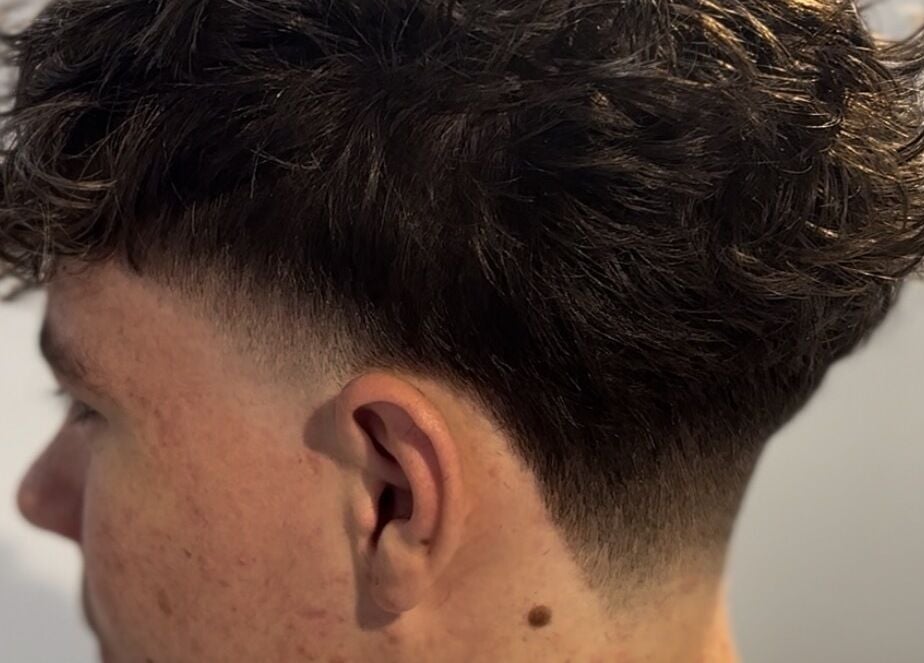 Textured fade hairstyle at HairbyLiam in Lara, Victoria, AU, showcasing expert barbering.