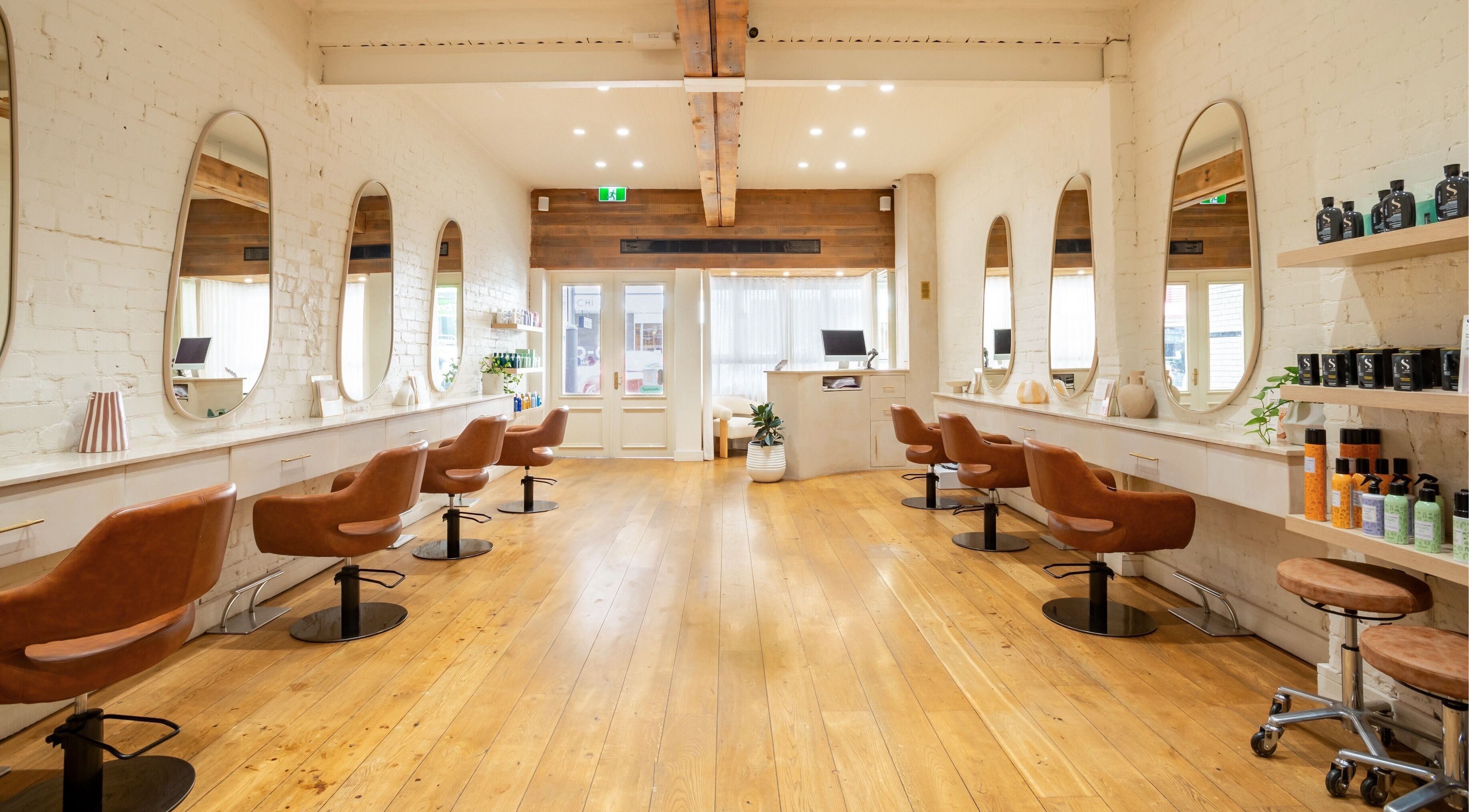Modern interior of Onda Coogee salon, Coogee, New South Wales, AU, showcasing stylish seating and decor.
