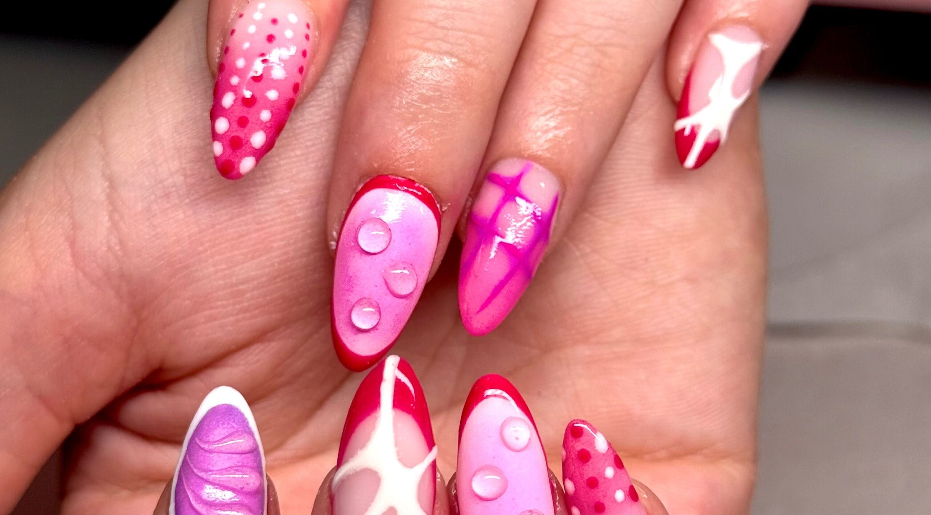 Vibrant pink and red nail art at Nails by Eden in Murrumba Downs, Queensland, AU.