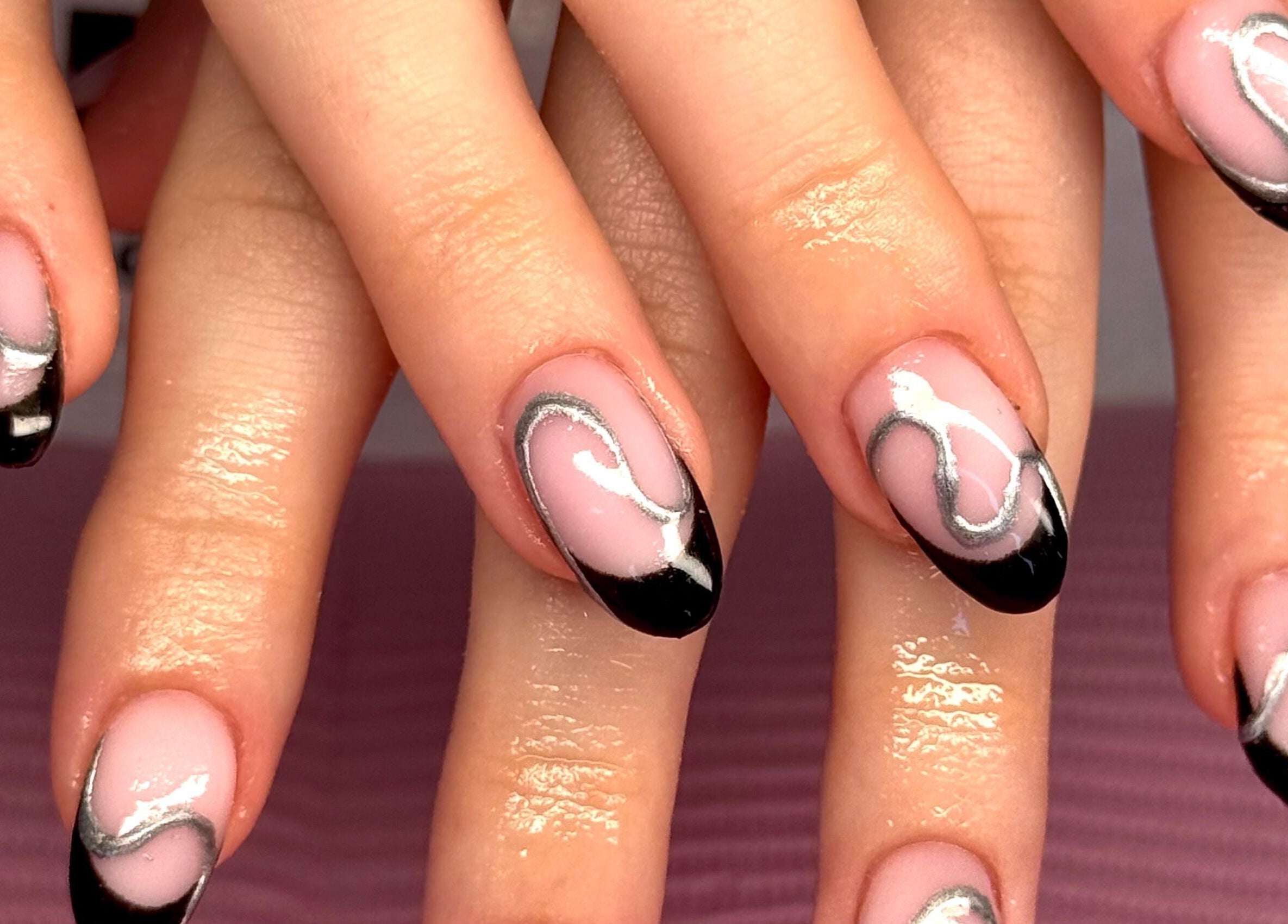 Stylish black and silver nail art by Nails by Eden in Murrumba Downs, Queensland, AU.