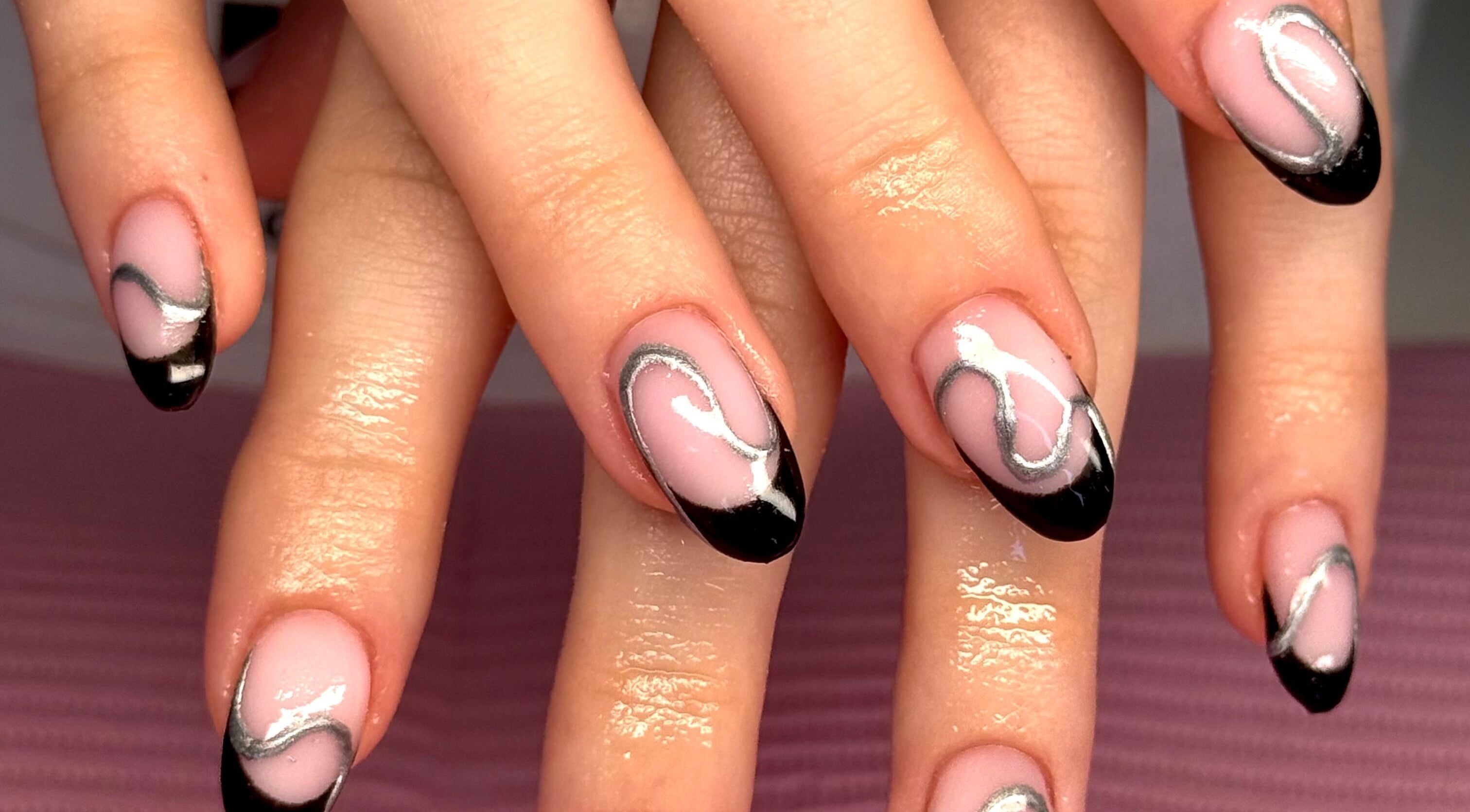 Stylish black and silver nail art by Nails by Eden in Murrumba Downs, Queensland, AU.
