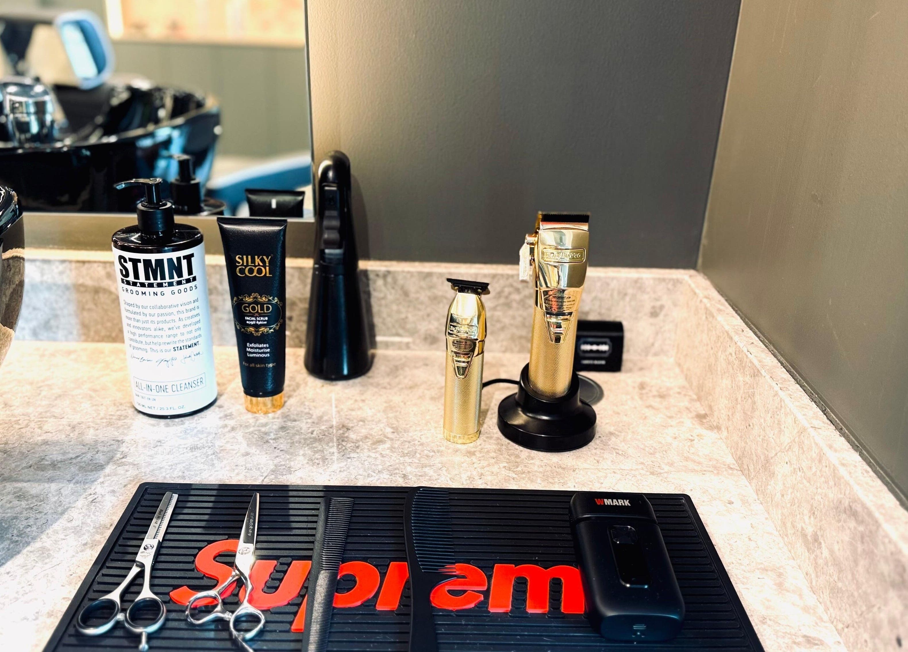 Professional grooming tools at B27 Barbershop, Dubai, AE. Stylish and modern barber equipment on display.