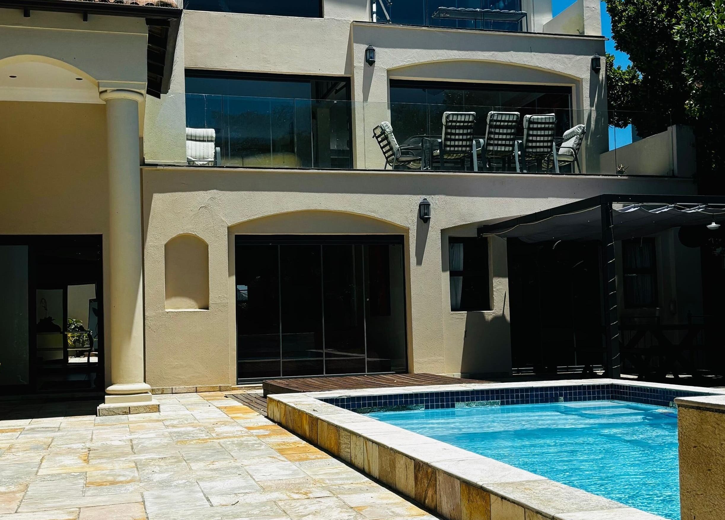 Elegant poolside view at Chalila Wellness, Cape Town, Western Cape, ZA, showcasing luxury and relaxation.