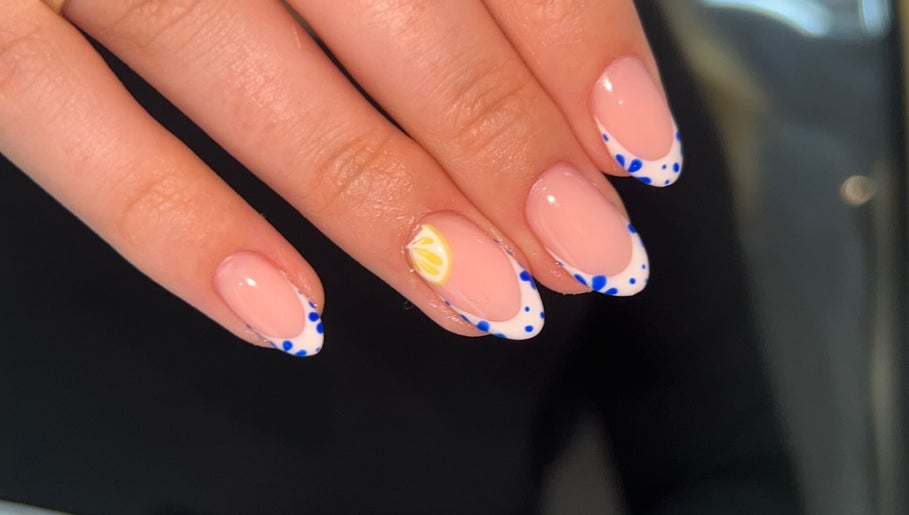 Stylish lemon-themed manicure at Ellie Johnson Beauty, Padiham, England, GB.