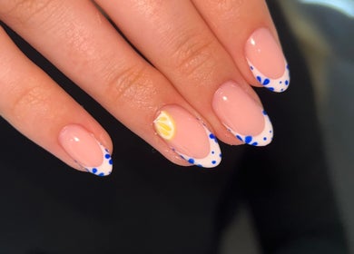 Stylish lemon-themed manicure at Ellie Johnson Beauty, Padiham, England, GB.