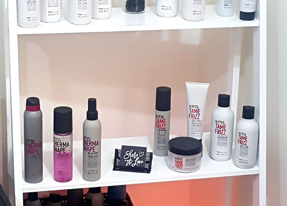 Product shelves at Bliss Beauty Bar in Strathpine, Queensland, AU displaying hair care essentials.