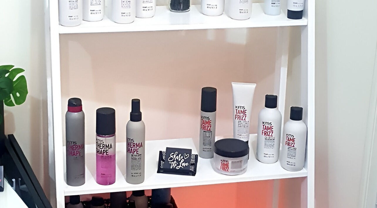 Product shelves at Bliss Beauty Bar in Strathpine, Queensland, AU displaying hair care essentials.