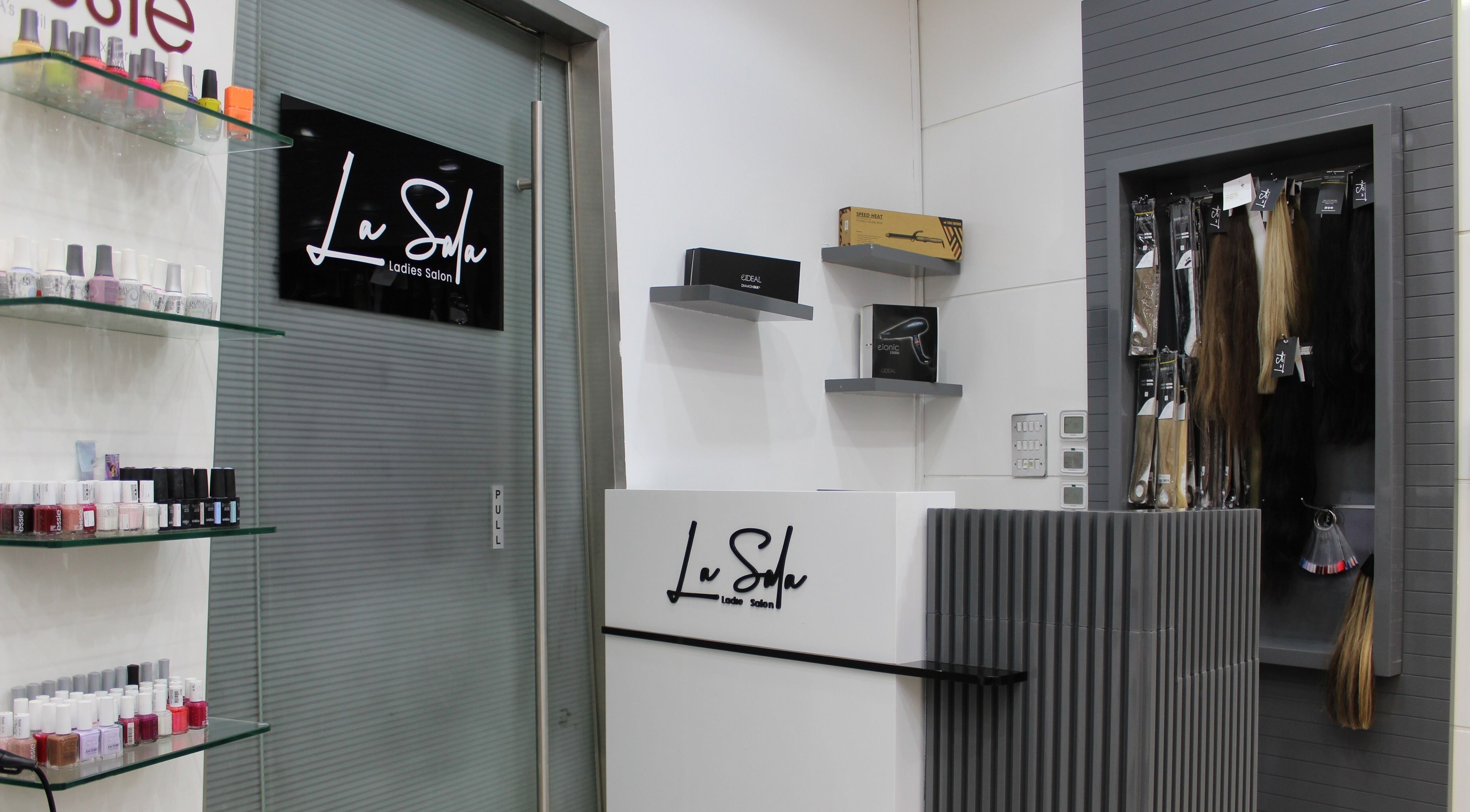 Reception area of La Sala Ladies Salon in Dubai, Dubai, AE showcasing beauty products and services.