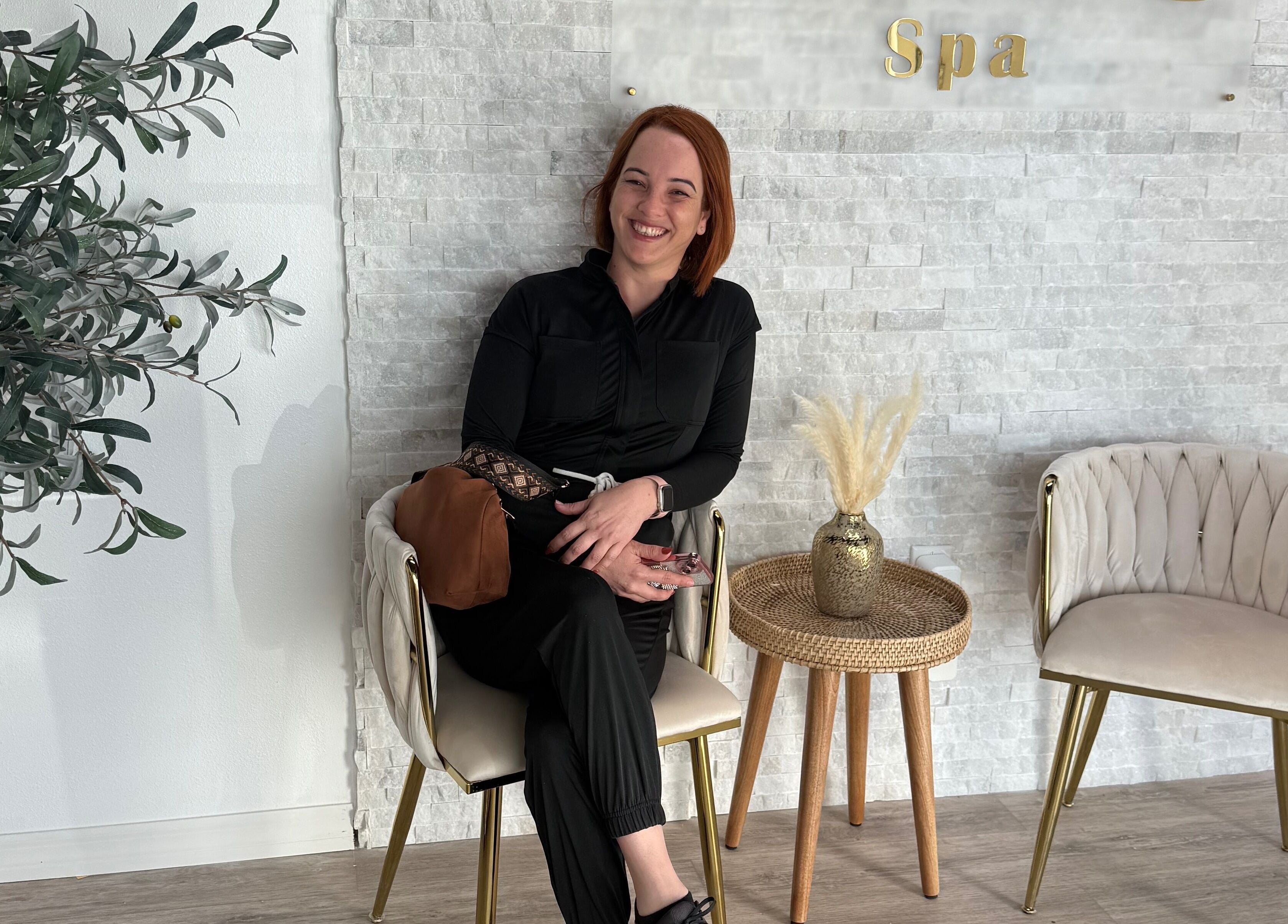 Welcoming seating area at Piko’s Spa in Sarasota, Florida, US, featuring stylish decor and cozy ambiance.