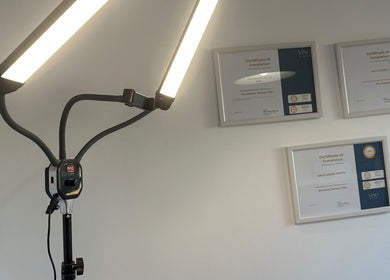 Certificates displayed at KalliJayne Aesthetics, Margate, England, GB under bright professional lighting.