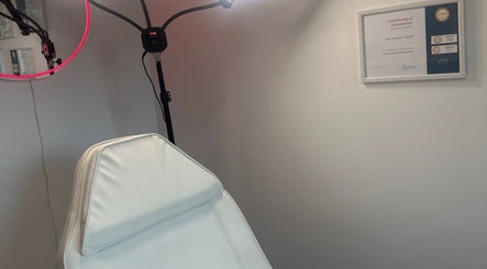 Treatment chair and light at KalliJayne Aesthetics, Margate, England, GB.