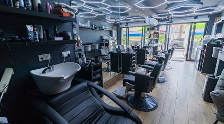 PLAN B | BALLUTA salon interior in Sliema, MT, showcasing stylish chairs and modern fixtures.