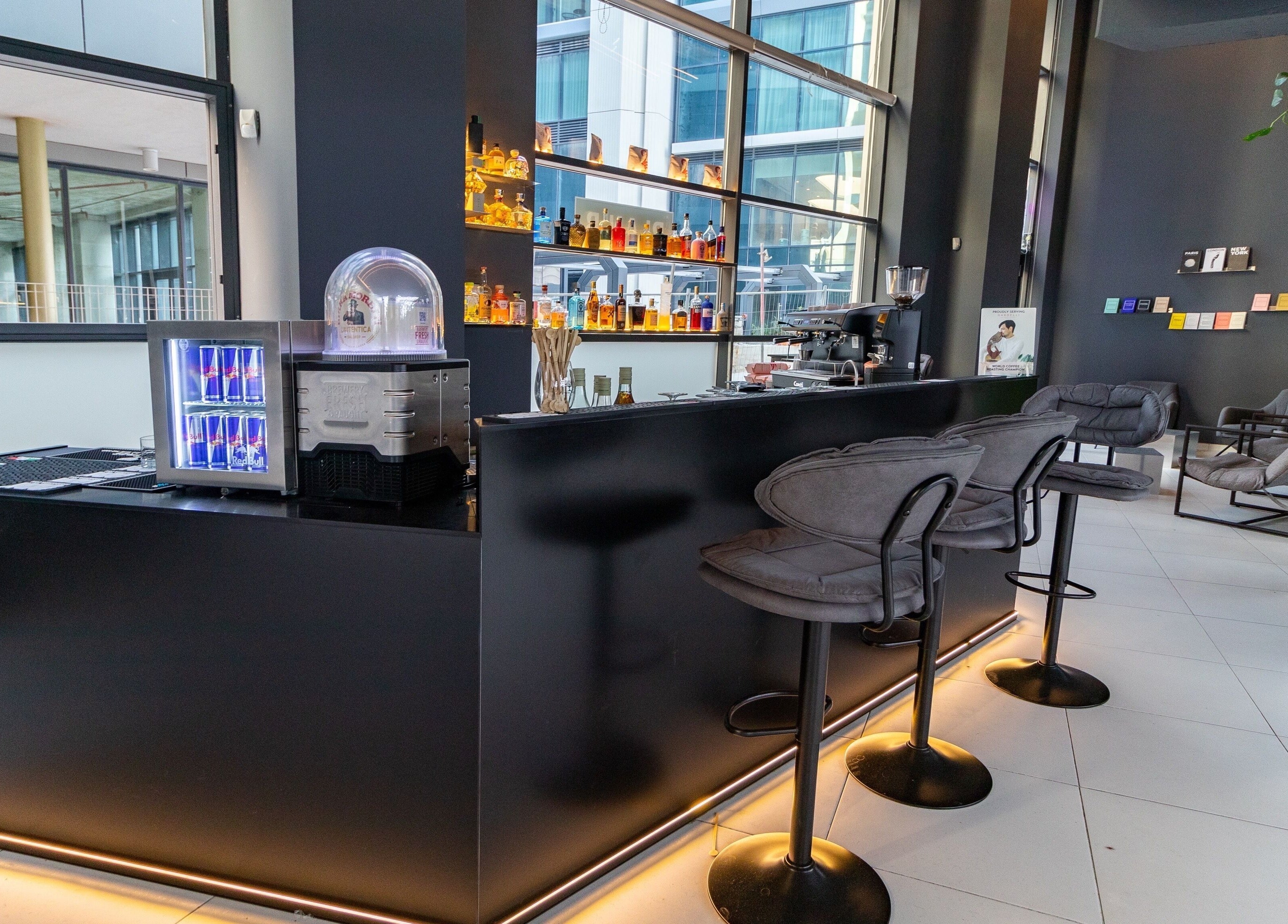 Elegant lounge at PLAN B | Mercury (St. Julian’s) featuring sleek bar stools in San Ġiljan, MT.