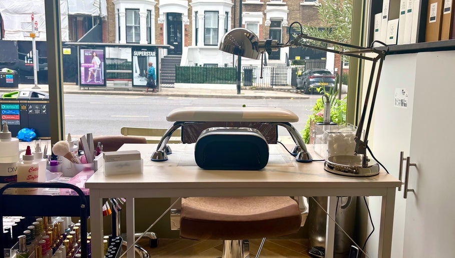 Manicure station at SetbyFloss, London, England, GB, featuring tools and supplies for perfect nails.