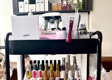 SetbyFloss beauty supplies cart in London, England, GB, showcasing nail polishes and grooming tools.