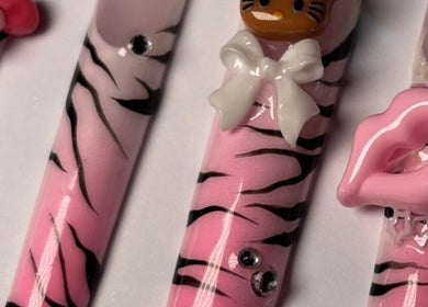 Pink zebra nail art with 3D charms at SetbyFloss, London, England, GB.