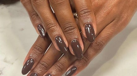Beautiful brown manicure at SetbyFloss in London, England, GB, showcasing elegant nail care.