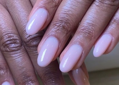 Close-up of elegant nails with a glossy finish at SetbyFloss, London, England, GB.