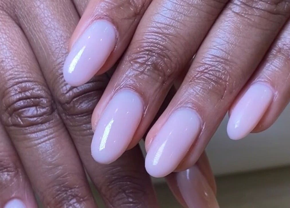 Close-up of elegant nails with a glossy finish at SetbyFloss, London, England, GB.