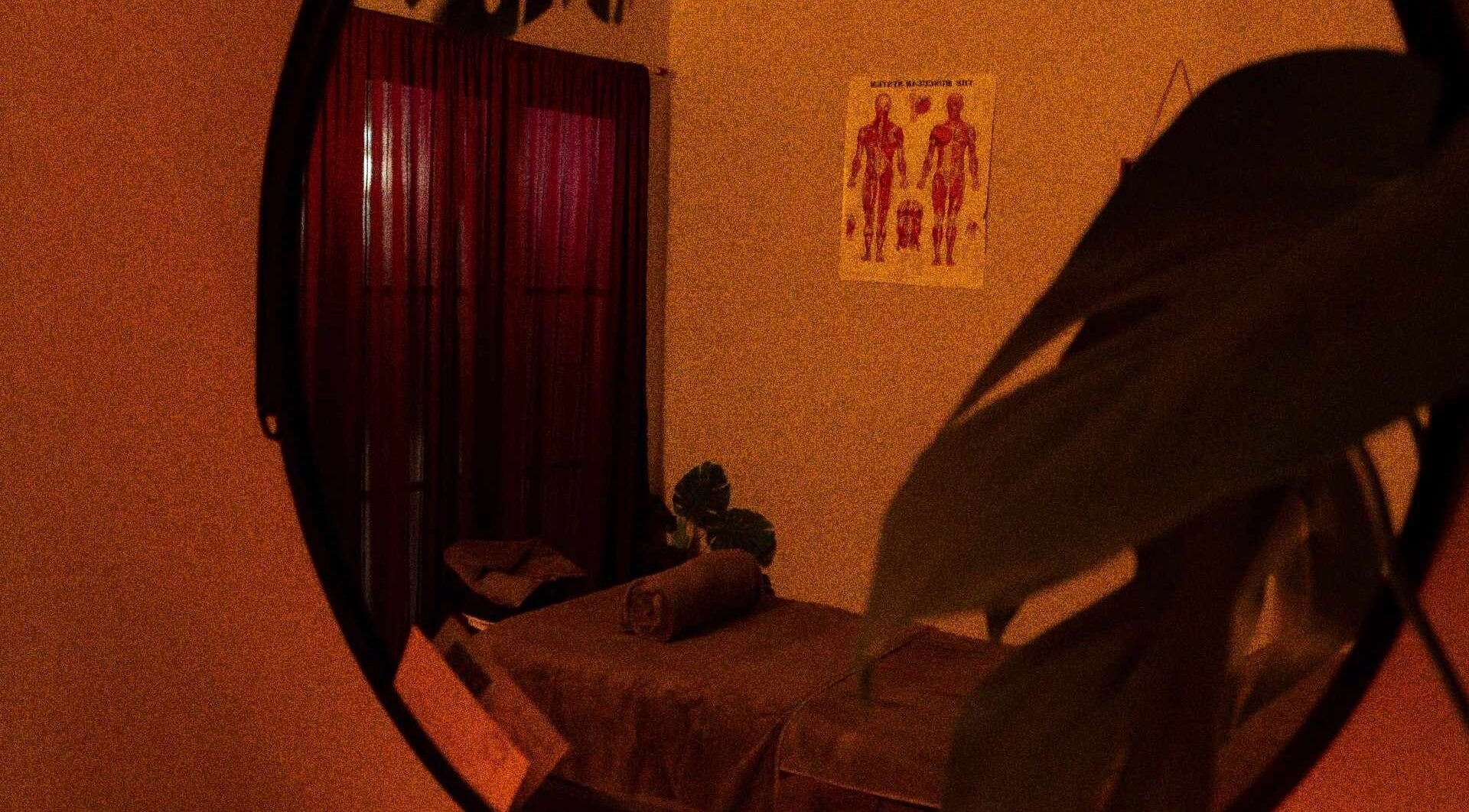 Relaxing massage room at Massage Em, Morrinsville, Waikato, NZ featuring warm tones and soothing decor.