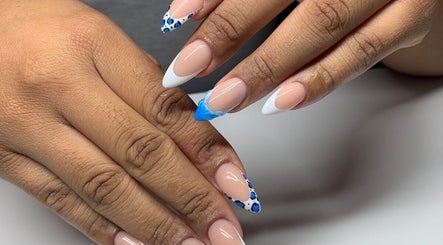 Stylish nail art with blue details at BodyScape Spa - Sunshine Outlet Mall Portmore, Portmore, St. Catherine Parish, JM.